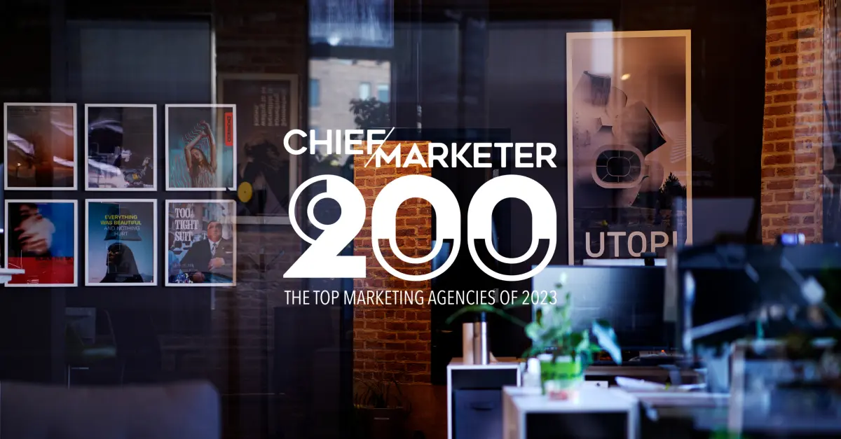 Next/Now office overlayed with text "Chief Marketer 200 - The Top Marketing Agencies of 2023"