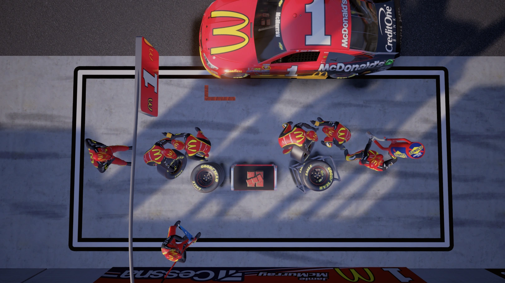 Aerial shot of the pit crew zone on a 3D-modeled raceway