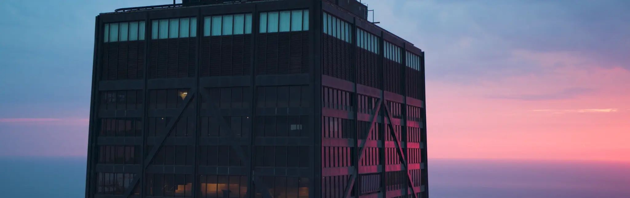 Sunrise photo of the top exterior on 847 N Michigan Avenue building in Chicago